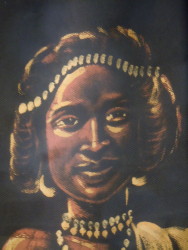 Ristorante Massawa: dipinto tipico di volto di una donna cunama