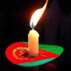 Foto di una candela in onore delle vittime eritree del mare
